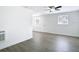 Open-concept living space featuring modern flooring and white wall paint at 3512 N 10Th St, Tampa, FL 33605