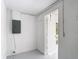 Neutral room featuring a door to the outside and electrical box at 3512 N 10Th St, Tampa, FL 33605