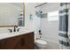 Modern bathroom with stylish wood vanity and shower/tub combo at 3528 Monday Ter, North Port, FL 34286