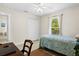 Comfortable bedroom with closet, bright window, and neutral color scheme at 3528 Monday Ter, North Port, FL 34286
