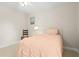 Well-lit bedroom with neutral walls and bright window at 3528 Monday Ter, North Port, FL 34286