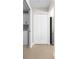 Hallway area with a closet and a laundry room with appliances in view at 3528 Monday Ter, North Port, FL 34286