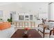 Well-lit kitchen with modern appliances, a breakfast bar with stools, and an open layout at 3528 Monday Ter, North Port, FL 34286