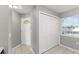Entryway featuring tile flooring, a double door closet, and a bright window at 3605 60Th W St, Bradenton, FL 34209