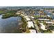 Waterfront community featuring lush landscaping, private docks, and stunning water views at 3875 Catalina Dr, Bradenton, FL 34210