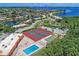 Aerial view of community amenities with pool, tennis courts, and recreation area at 3875 Catalina Dr, Bradenton, FL 34210