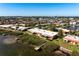Waterfront community featuring lush landscaping, private docks, and stunning water views at 3875 Catalina Dr, Bradenton, FL 34210