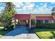 Charming condo with a carport and well-maintained landscaping offers a welcoming exterior at 3875 Catalina Dr, Bradenton, FL 34210
