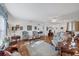 Bright living room with hardwood floors, neutral walls, and traditional decor at 4058 Oakhurst Dr # 3174, Sarasota, FL 34233