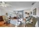 Bright and airy living room with hardwood floors and traditional furnishings at 4058 Oakhurst Dr # 3174, Sarasota, FL 34233