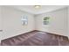 Comfortable bedroom with neutral carpet, bright windows, and a serene atmosphere, ideal for relaxation and rest at 436 Parkview Dr, Sarasota, FL 34243