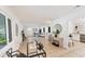 Large living room with an open floor plan, seamlessly transitioning to dining and kitchen areas at 436 Parkview Dr, Sarasota, FL 34243