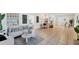 Bright living room featuring tile floors and ample natural light at 436 Parkview Dr, Sarasota, FL 34243