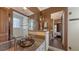 Elegant bathroom showcasing granite counters, and a glass shower door at 4941 Commonwealth Dr, Sarasota, FL 34242