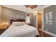 Comfortable bedroom with natural light and hardwood floors at 4941 Commonwealth Dr, Sarasota, FL 34242