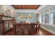 Elegant dining room with hardwood floors and natural light at 4941 Commonwealth Dr, Sarasota, FL 34242