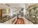 Modern kitchen featuring stainless steel appliances, granite countertops, and a stylish tile backsplash at 4941 Commonwealth Dr, Sarasota, FL 34242