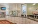 Modern kitchen featuring granite countertops, stainless steel appliances, and ample cabinet space at 4941 Commonwealth Dr, Sarasota, FL 34242