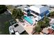 Stunning waterfront home with private boat lift and gorgeous luxurious swimming pool at 511 Bayview Dr, Holmes Beach, FL 34217