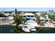 Gorgeous two-story waterfront home with luxurious pool and private boat dock at 511 Bayview Dr, Holmes Beach, FL 34217