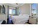 Enjoy lots of natural light in this bedroom with access to a balcony at 511 Bayview Dr, Holmes Beach, FL 34217