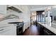 Gourmet kitchen with stainless steel appliances and marble countertops and backsplash at 511 Bayview Dr, Holmes Beach, FL 34217