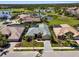 Beautiful aerial view of home, golf course, and lakes in a gated community at 5270 White Ibis Dr, North Port, FL 34287