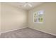 A bright bedroom with a ceiling fan and a shuttered window at 5270 White Ibis Dr, North Port, FL 34287