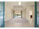 Bright and airy living room with access to a pool view and an open floor plan at 5270 White Ibis Dr, North Port, FL 34287