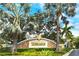 Stonehaven community sign surrounded by lush greenery and palm trees, creating a welcoming entrance at 5450 Soapstone Pl # 9-103, Sarasota, FL 34233