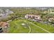Aerial view of a lovely condo community with golf course and lush green surroundings creating a peaceful atmosphere at 6002 Oak Creek Ln # 1925, Bradenton, FL 34210