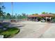 Golf carts and tennis courts are present at the community recreation area at 6002 Oak Creek Ln # 1925, Bradenton, FL 34210