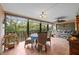 Spacious lanai featuring a dining area, comfortable seating, and serene views of the surrounding nature at 6002 Oak Creek Ln # 1925, Bradenton, FL 34210