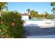 Enjoy a refreshing swim in the sparkling pool, surrounded by lush landscaping at 6002 Oak Creek Ln # 1925, Bradenton, FL 34210