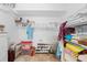 Walk-in closet with shelving units providing ample storage for clothes, shoes, and accessories at 6002 Oak Creek Ln # 1925, Bradenton, FL 34210