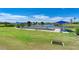 Bocce ball court with shaded seating and a view of the lake, ideal for leisurely recreation at 6503 Fairway Gardens Dr # 20-201, Bradenton, FL 34203