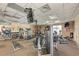 Well-equipped gym with weight machines, free weights, and mounted TVs for a complete fitness experience at 6503 Fairway Gardens Dr # 20-201, Bradenton, FL 34203