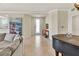 Inviting foyer with tile floors and neutral walls, complemented by an elegant front door and tasteful decor at 6708 Grand Estuary Trl # 104, Bradenton, FL 34212