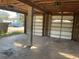 Spacious garage with two doors, offering ample parking and storage space, plus a view outside at 6907 21St W St, Bradenton, FL 34207