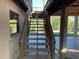 Outdoor stairway leads from the lower level to the main level at 6907 21St W St, Bradenton, FL 34207