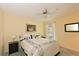 Bedroom with a ceiling fan, natural light, and an open window at 6912 Drewrys Blf # 608, Bradenton, FL 34203