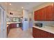 Spacious kitchen with granite countertops, stainless steel appliances, and view to living space at 6912 Drewrys Blf # 608, Bradenton, FL 34203
