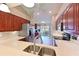Modern kitchen features stainless steel appliances, granite countertops, and ample cabinet space at 6912 Drewrys Blf # 608, Bradenton, FL 34203