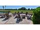 Outdoor seating area with a golf course view, perfect for relaxing and enjoying the community at 6912 Drewrys Blf # 608, Bradenton, FL 34203