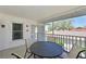 Screened patio with a table and chairs, overlooking neighborhood views at 6912 Drewrys Blf # 608, Bradenton, FL 34203