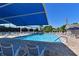 Beautiful pool with ample seating and a large sun shade at 6912 Drewrys Blf # 608, Bradenton, FL 34203