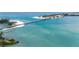 Breathtaking aerial showing the bridge, surrounding waters, and nearby islands at 710 Fox St, Longboat Key, FL 34228