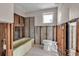 Bathroom featuring a vintage bathtub and toilet ready for renovation and customization at 710 Fox St, Longboat Key, FL 34228