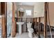 Bathroom featuring a pedestal sink, toilet, and potential shower area awaiting custom renovation at 710 Fox St, Longboat Key, FL 34228