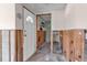 Entryway featuring a white door, ready for renovation and enhanced design at 710 Fox St, Longboat Key, FL 34228